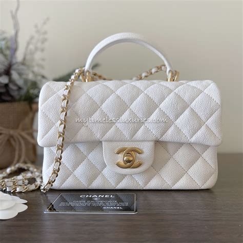 white chanel handle bag|Chanel bag with top handle.